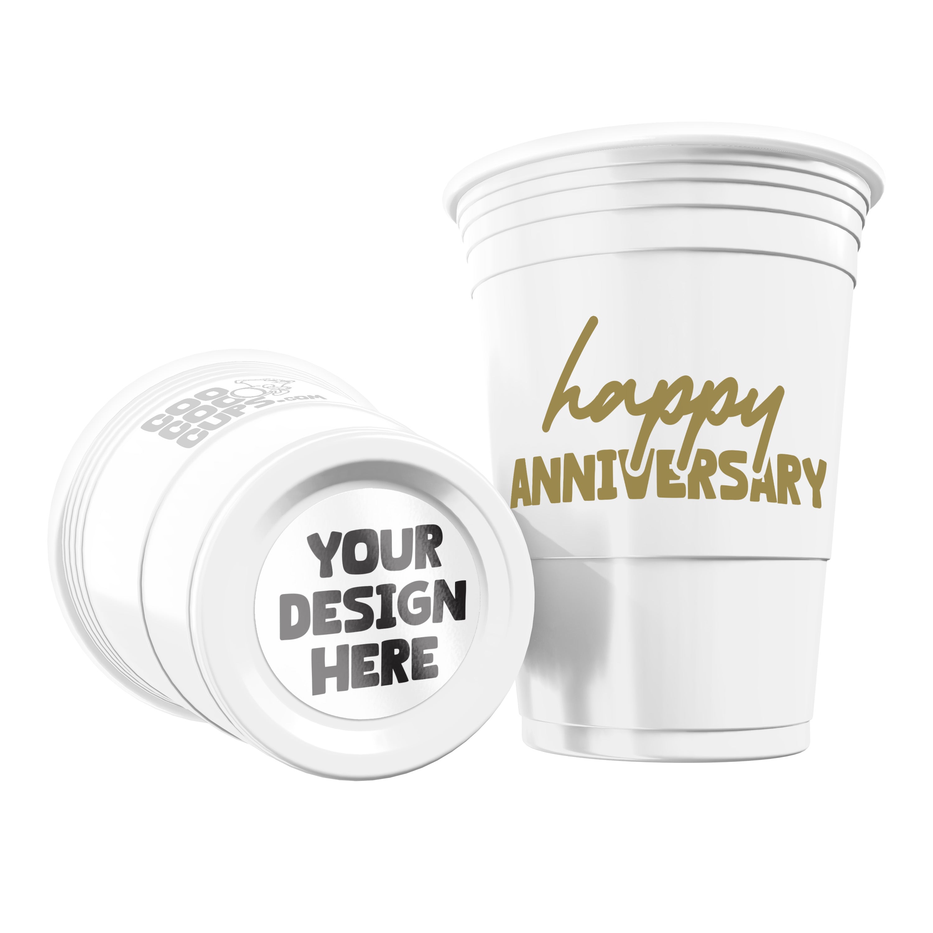 Two white CooCoo Cups® are shown. One displays the gold text “Happy Anniversary” while the other lies on its side, revealing a customizable bottom sticker labeled “Your Design Here.”