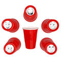 Red CooCoo Cups® are shown with bottom stickers featuring expressive and hilarious face illustration.